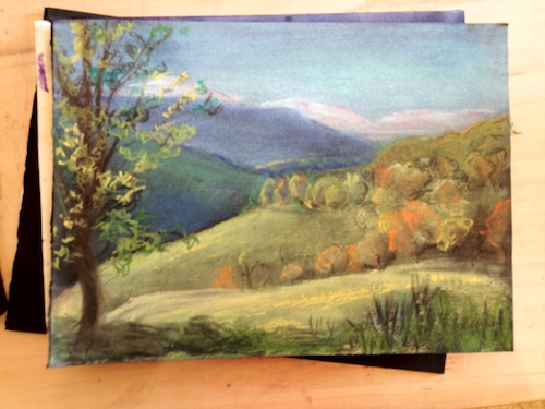 a pastel landscape of the Umbrian countryside