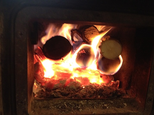 a roaring fire in the oven in the studio